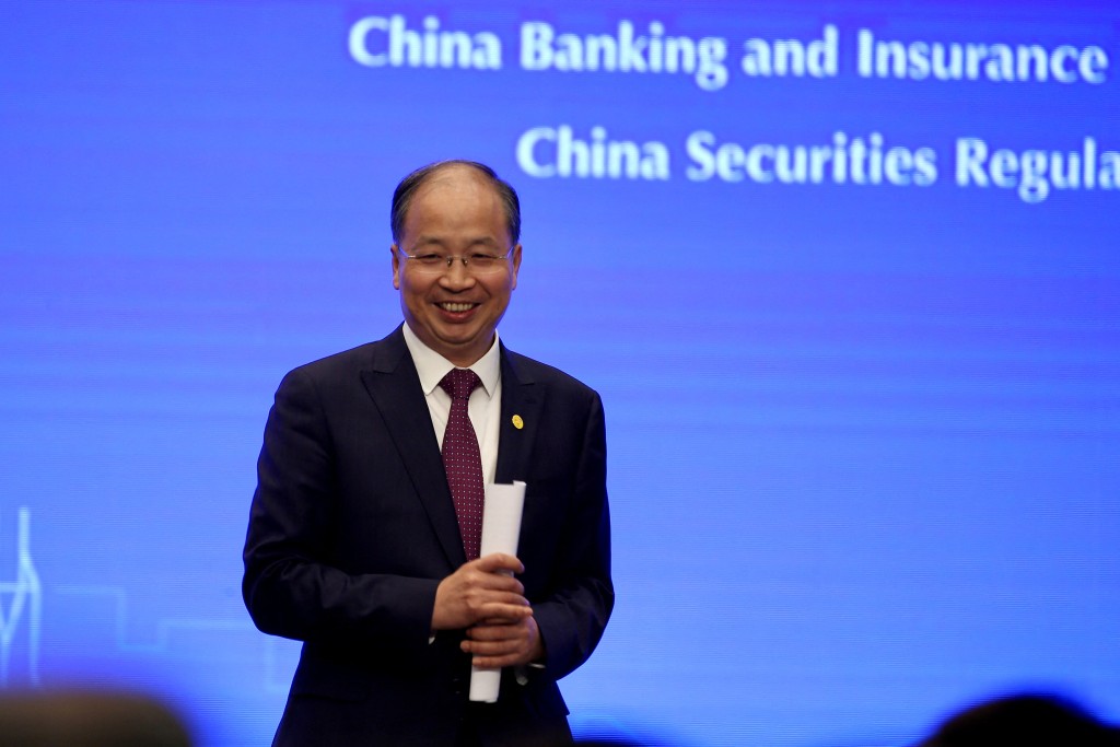 Chairman of China Securities Regulatory Commission (CSRC) Yi Huiman attends the Lujiazui financial forum in Shanghai, China June 13, 2019./File Photo