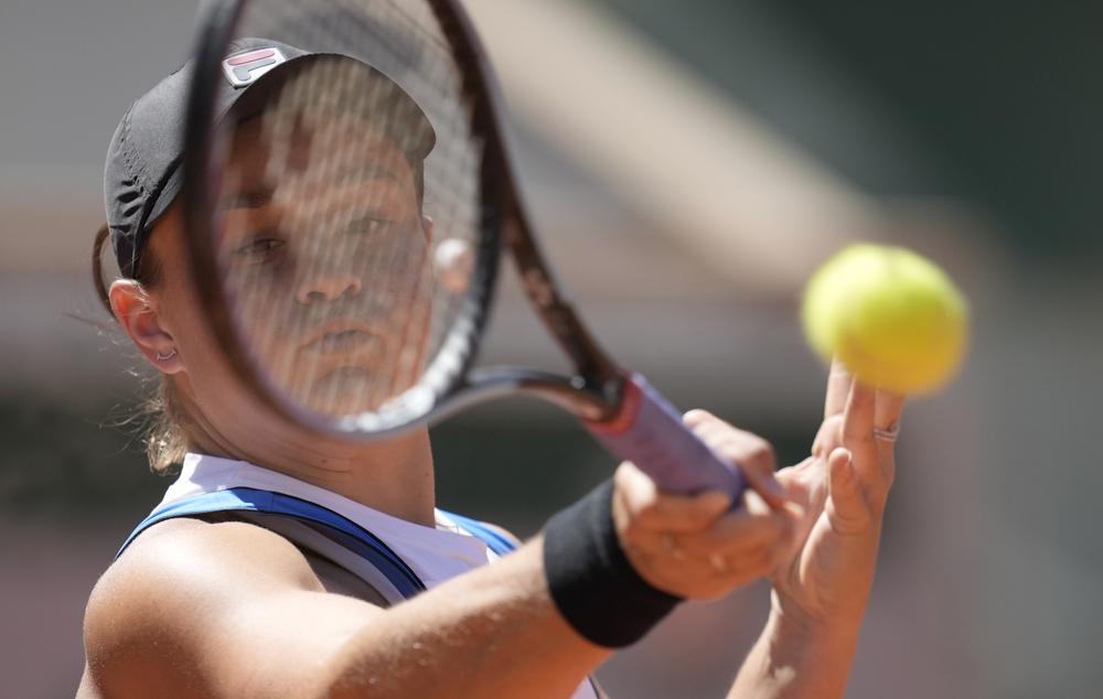 Australia's Ashleigh Barty plays a return to United States's Bernarda Pera during their first round match on day three of the French Open tennis tournament at Roland Garros in Paris, France, Tuesday, June 1, 2021. Australia's Ashleigh Barty plays a return to United States's Bernarda Pera during their first round match on day three of the French Open tennis tournament at Roland Garros in Paris, France, Tuesday, June 1, 2021.