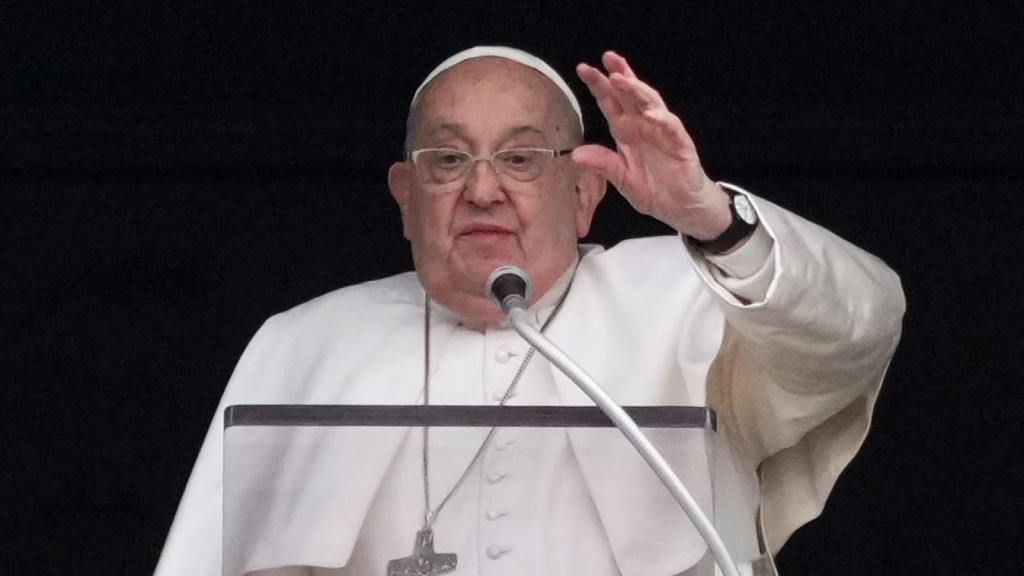 FILE - Pope Francis delivers his blessing as he recites the Angelus noon prayer from the window of his studio overlooking St.Peter's Square, at the Vatican, Sunday, Jan. 19, 2025. (AP Photo/Andrew Medichini, file)
