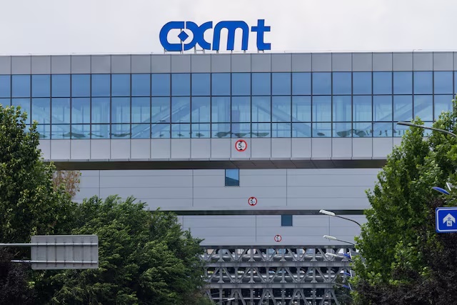 A logo of China's top memory chipmaker CXMT appears on the facade of company's production facility, in Beijing, China, July 29, 2026. REUTERS/Maxim Shemetov