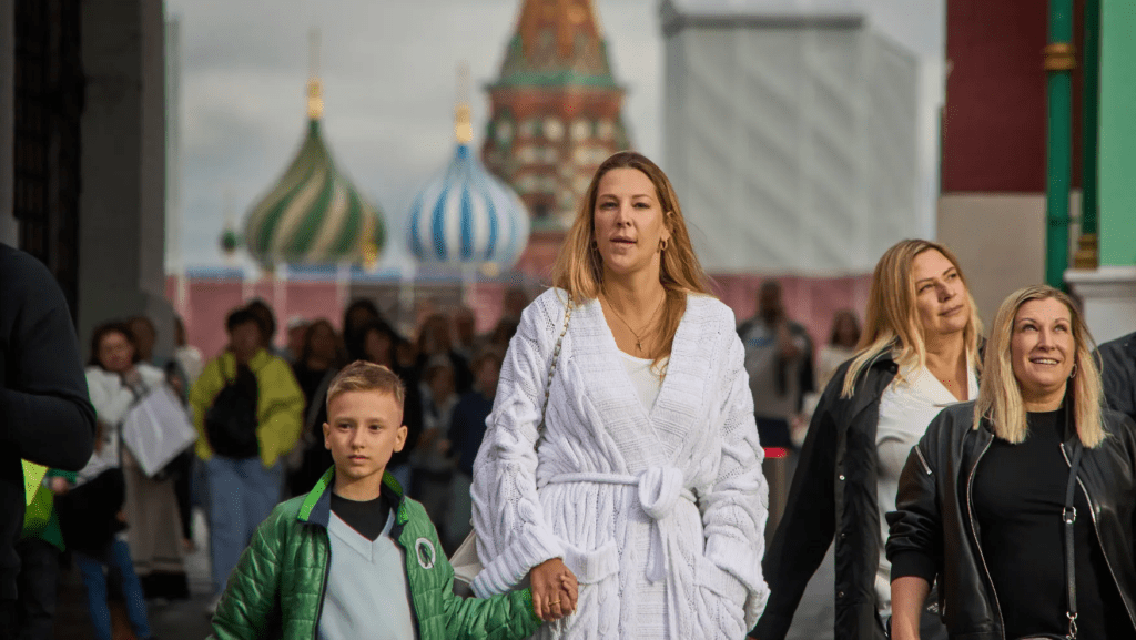 FILE – People walk from Red Square with St. Basil’s Cathedral in the background in Moscow, Russia, Thursday, Aug. 14, 2025. (AP Photo/Alexander Zemlianichenko, File)