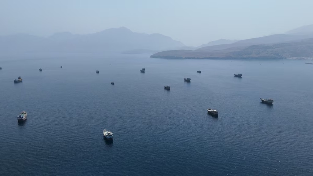 A drone view shows vessels near the Strait of Hormuz, as seen from Musandam, Oman, August 28, 2026. REUTERS/Stringer/File Photo