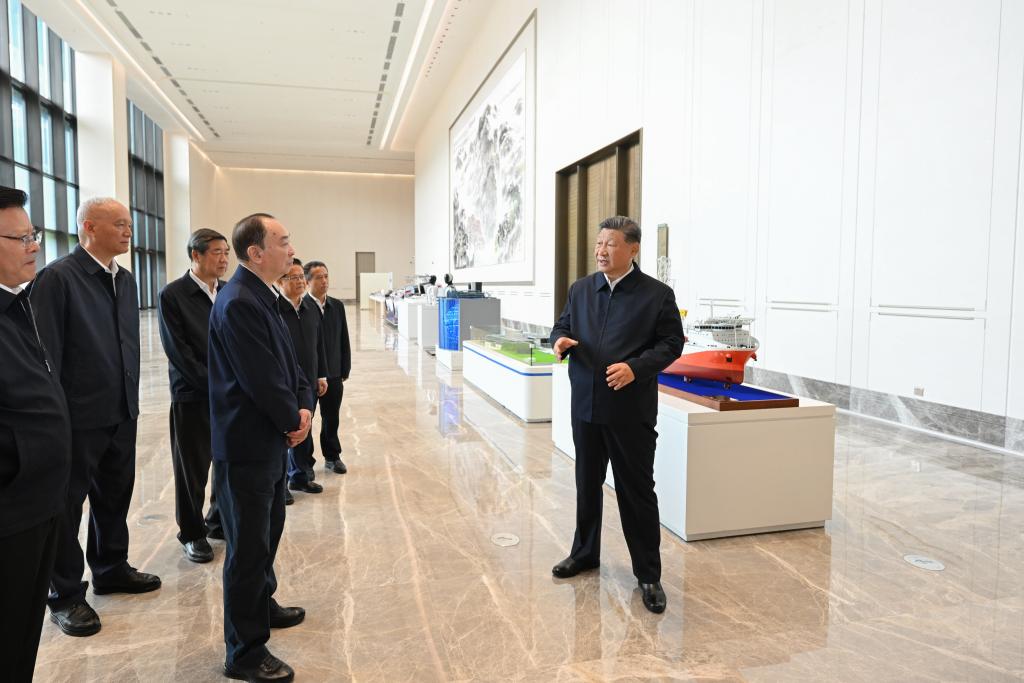 Chinese President Xi Jinping, also general secretary of the Communist Party of China Central Committee and chairman of the Central Military Commission, inspects the exhibition of Guangdong's achievements in the integrated development of technological and industrial innovation in Guangzhou, south China's Guangdong Province, Nov. 8, 2025. Xi made an inspection tour in south China's Guangdong Province on Friday and Saturday. (Xinhua/Xie Huanchi)