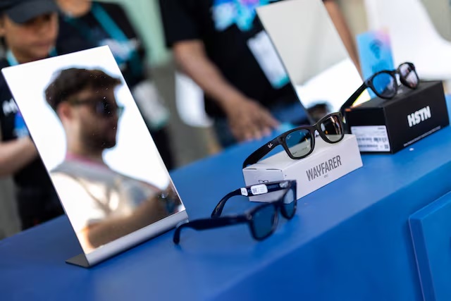 A visitor reviews the new Meta smart glasses during the Meta annual Connect conference at the company's headquarters in Menlo Park, California, U.S., September 16, 2025. REUTERS/Carlos Barria 