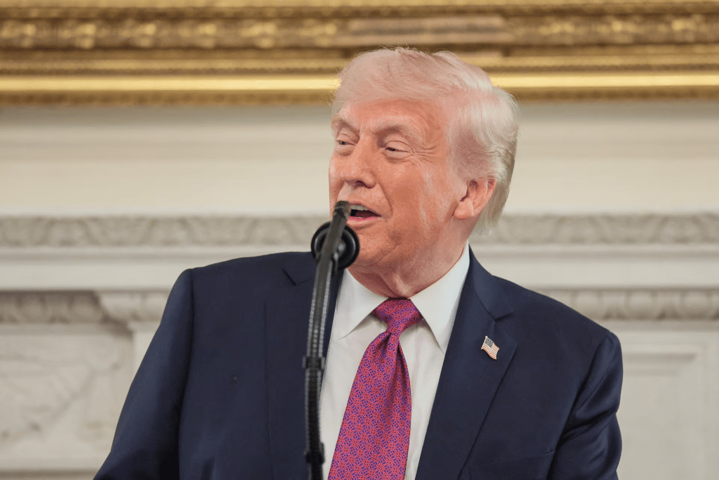 U.S. President Donald Trump delivers remarks to NCAA Collegiate National Champions in the State Dining Room at the White House in Washington, D.C., U.S., April 21, 2026. REUTERS/Kylie Cooper 