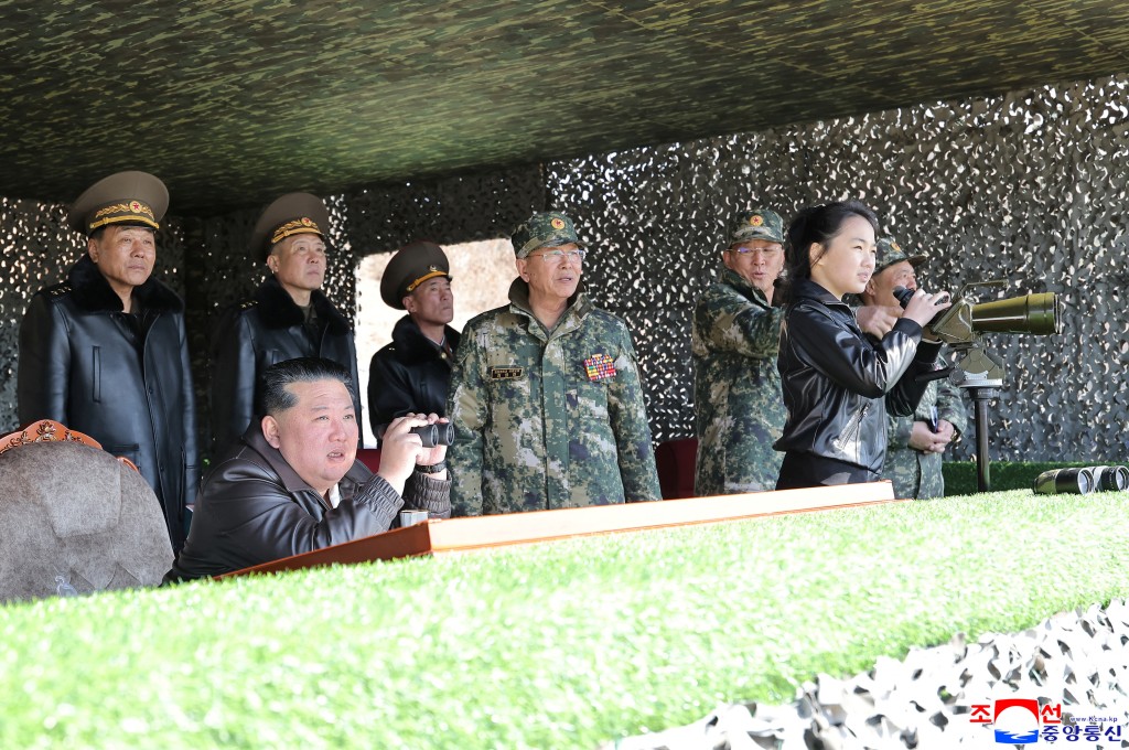 North Korean leader Kim Jong Un, accompanied by his daughter Kim Ju Ae, supervises what North Korean state news agency KCNA reports is an offensive tactical drill involving a new type of tank, at a training base in Pyongyang, North Korea, March 19, 2026. (Reuters/File)