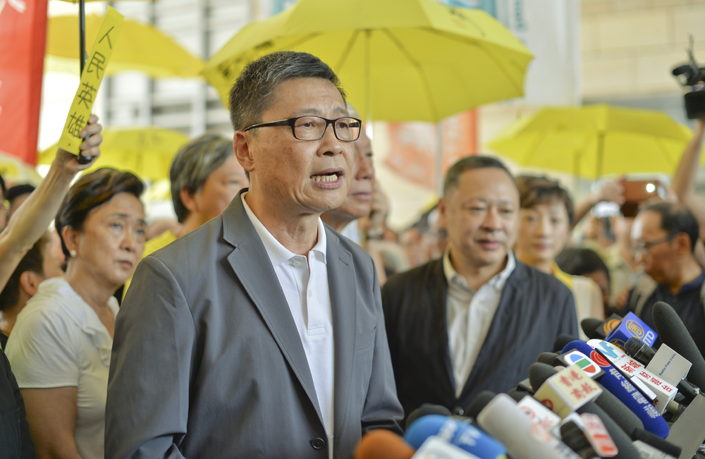 Security law hangs over Chan as taipei stint begins