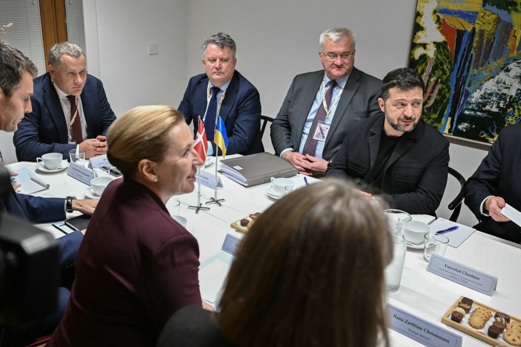 Photo by NICOLAS TUCAT / POOL / AFP  Ukraine's President Volodymyr Zelensky (R), next to Ukraine's Foreign Minister Andriy Sybiga (2nd-R), attends a bilateral meeting with Denmark's Prime Minister Mette Frederiksen (2nd-L) on the sidelines of an EU summit in Brussels on October 15, 2026.