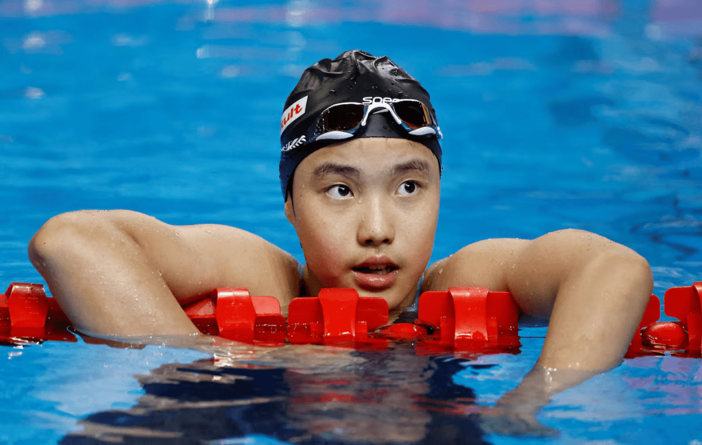 Swimming - World Aquatics Championships - Women 400m Medley - World Aquatics Championships Arena, Singapore - August 3, 2025 China's Zidi Yu reacts at the end of heat 2 REUTERS/Tingshu Wang/File Photo