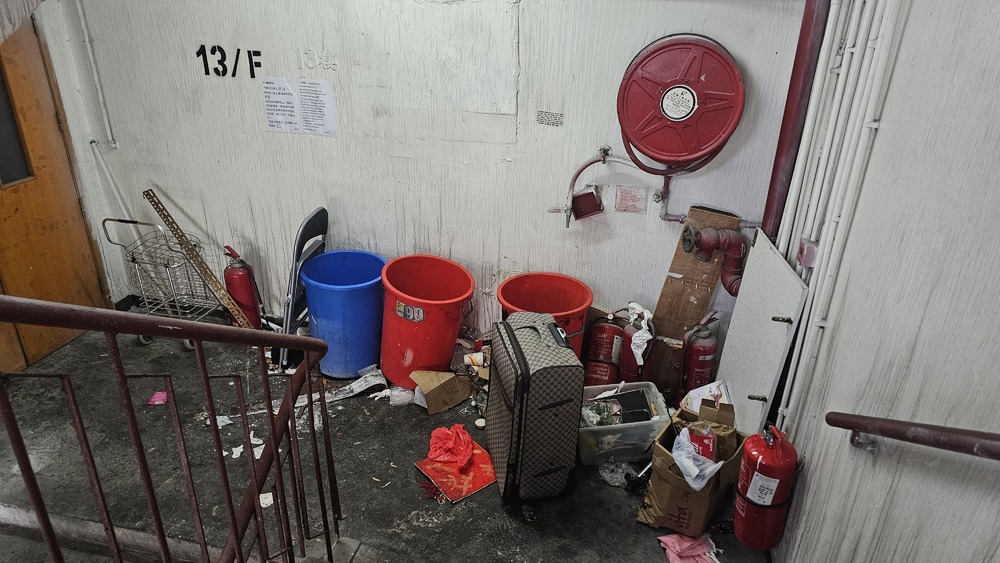 New Lucky House stairways blocked with rubbish. Sing Tao New Lucky House stairways blocked with rubbish. Sing Tao