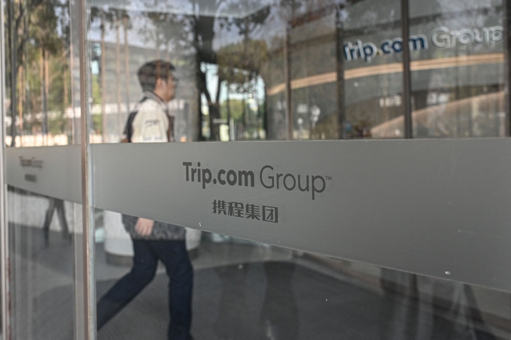 The logo of Trip.com Group is seen at its headquarter in Shanghai on January 15, 2026. Photo by Jade GAO / AFP