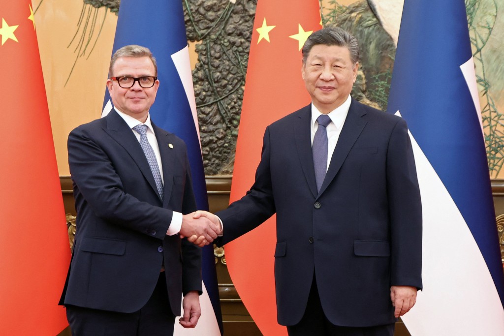 Chinese President Xi Jinping and Finland's Prime Minister Petteri Orpo shake hands at the Great Hall of the People in Beijing, China January 27, 2026. (Reuters)