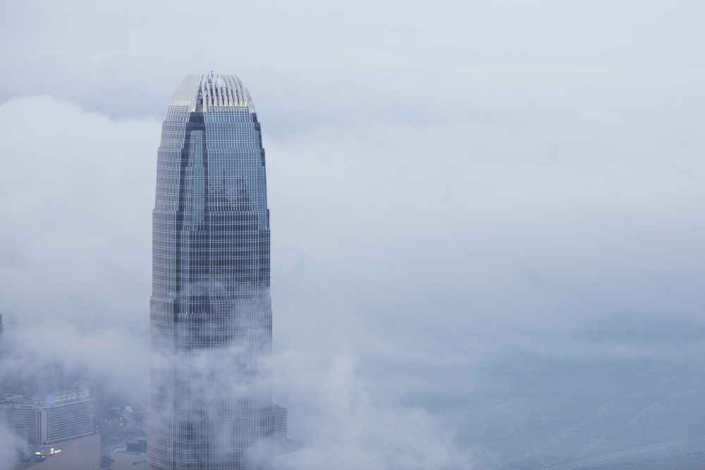 Two International Financial Center (IFC), stands shrouded in clouds in Hong Kong. (Bloomberg) Two International Financial Center (IFC), stands shrouded in clouds in Hong Kong. (Bloomberg)