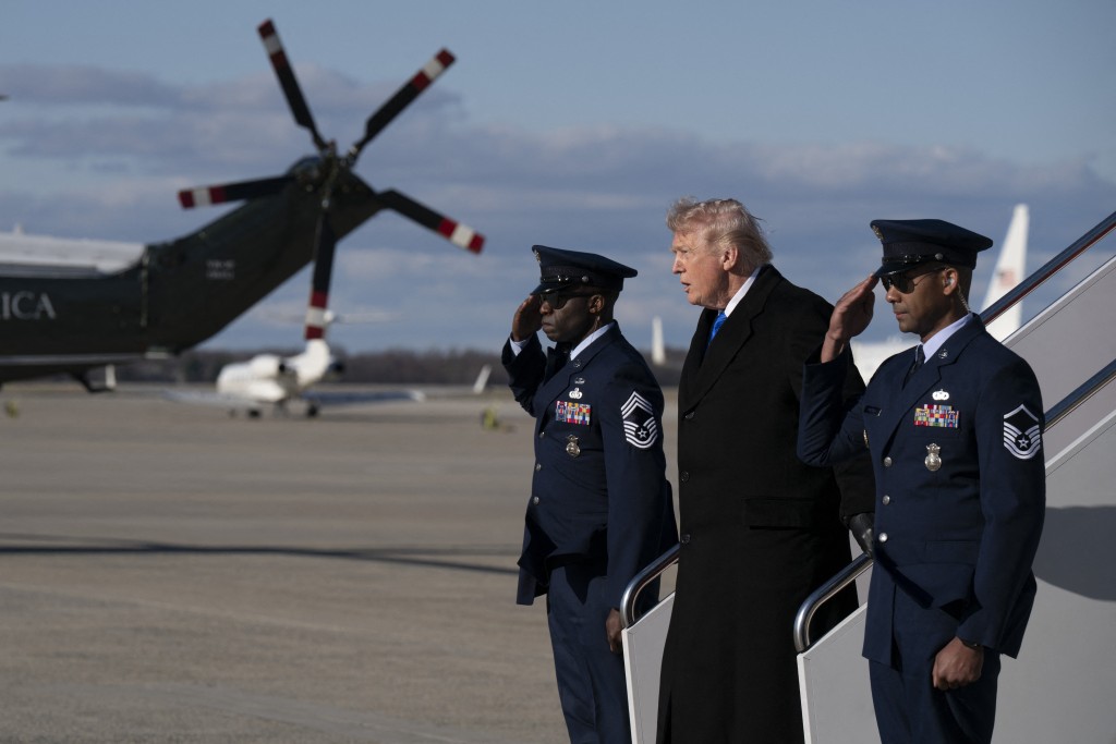 U.S. President Donald Trump disembarks from Air Force One on March 23, 2026 in Joint Base Andrews, Maryland. President Trump arrived from Memphis, Tennessee after participating in a roundtable discussion regarding the Memphis Safe Task Force (MSTF) in combating violent crime. Roberto Schmidt/Getty Images/AFP