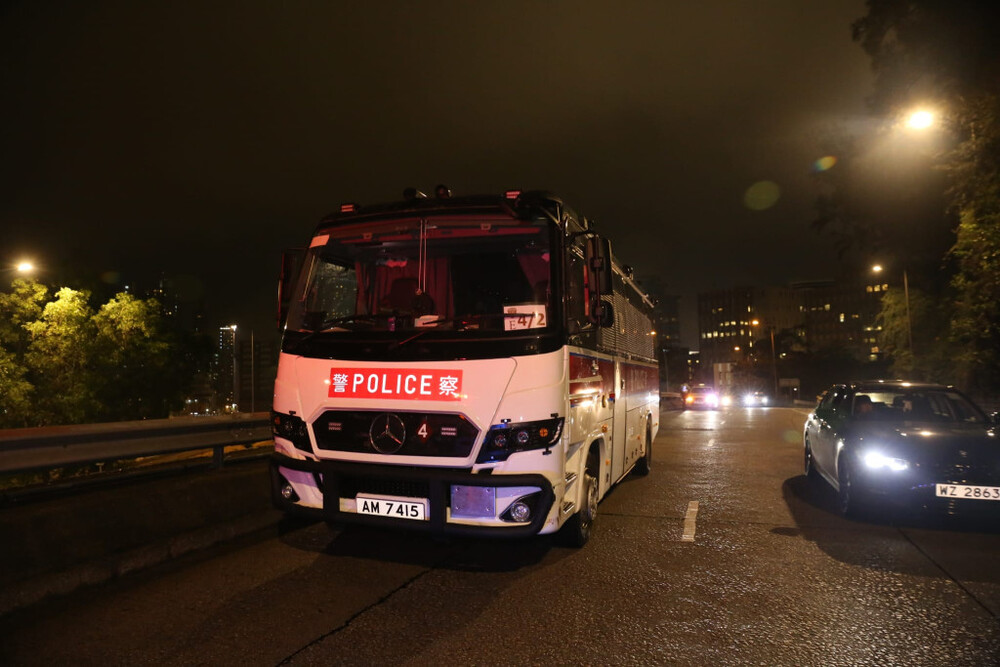A tactical coach of the police force on Sunday night collided with a private car carrying the founder of the city’s largest property agency.