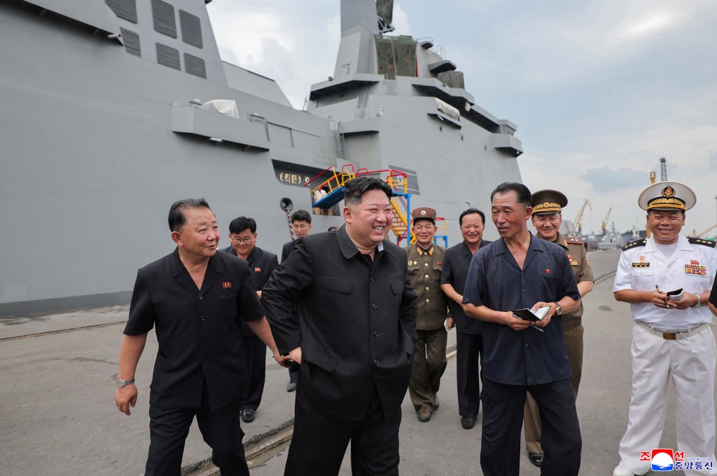 This picture taken on August 18, 2025 and released from North Korea's official Korean Central News Agency (KCNA) via KNS on August 19, 2025 shows North Korea's leader Kim Jong Un (C) inspecting the naval destroyer "Choe Hyon" at an undisclosed location in North Korea. North Korean leader Kim Jong Un called on August 19 for the "rapid expansion" of the country's nuclear weapons capability, citing ongoing US-South Korea military exercises that he said could "ignite a war". (Photo by KCNA VIA KNS / AFP)