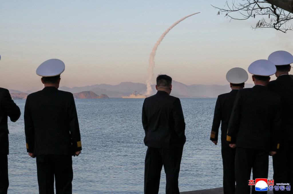 North Korean leader Kim Jong Un observes as strategic cruise missiles and anti-warship missiles are test-fired from the destroyer Choe Hyon, North Korea, April 12, 2026. (Reuters/File)