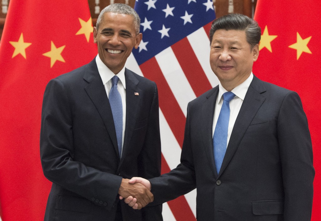 Photo by SAUL LOEB / AFP Chinese President Xi Jinping (R) and US President Barack Obama (L) shake hands prior to a meeting at the West Lake State House in Hangzhou on September 3, 2016. Photo by SAUL LOEB / AFP Chinese President Xi Jinping (R) and US President Barack Obama (L) shake hands prior to a meeting at the West Lake State House in Hangzhou on September 3, 2016.