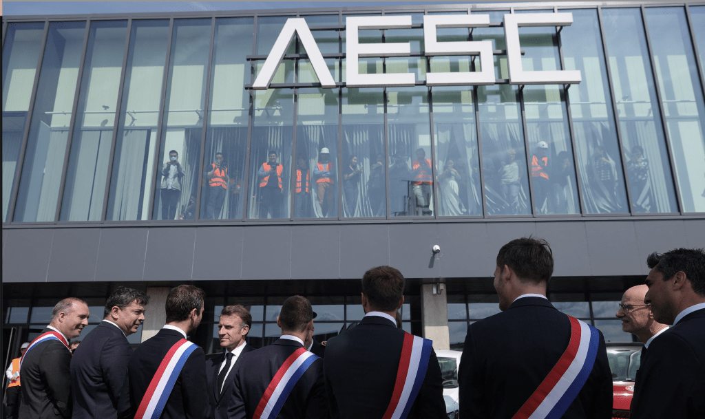 French President Emmanuel Macron arrives for a visit to the Envision AESC battery production plant in Douai, France, June 3, 2025. REUTERS
