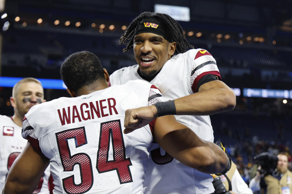 Washington Commanders quarterback Jayden Daniels celebrates with Bobby Wagner (54) after an NFL football divisional playoff game against the Detroit Lions, Saturday, Jan. 18, 2025, in Detroit. (AP Photo/Rey Del Rio)ASSOCIATED PRESS