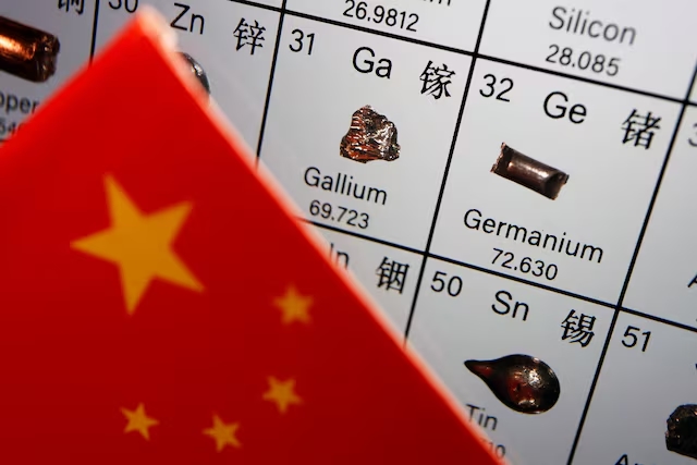 The flag of China is placed next to the elements of Gallium and Germanium on a periodic table, in this illustration picture taken on July 6, 2023. (Reuters)