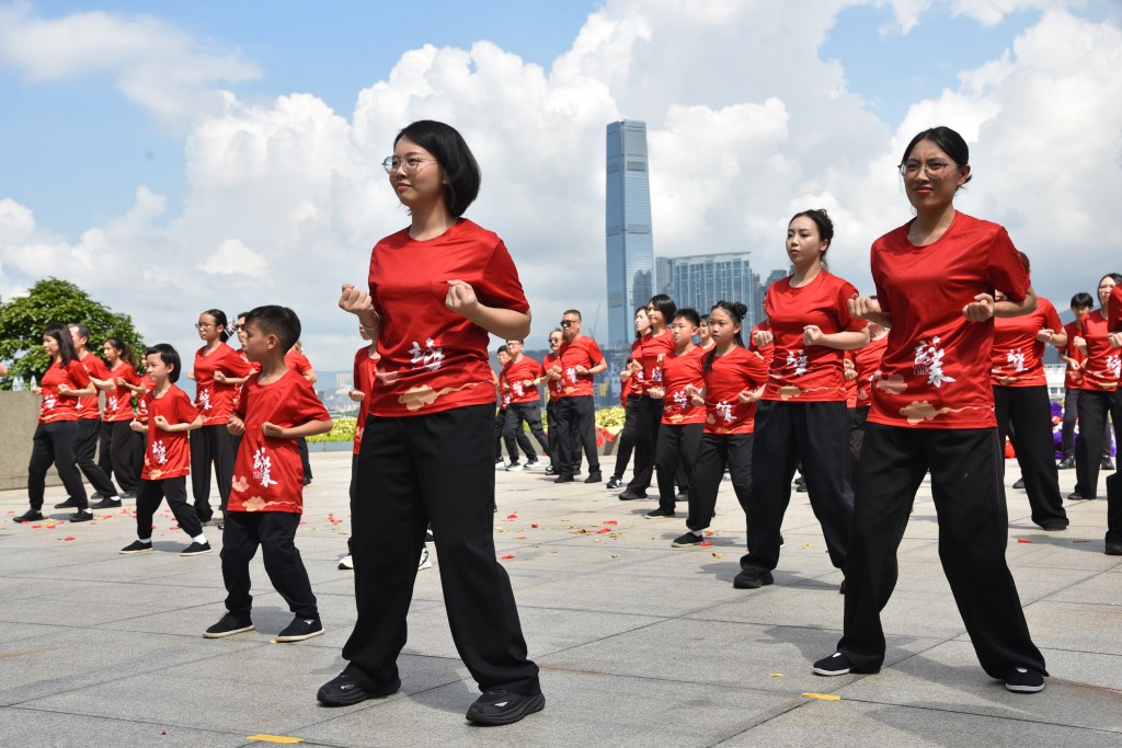 Seventy-seven Wing Chun practitioners aged six to 70 performed a series of traditional routines at Tamar Park on Sunday to celebrate the 77th anniversary of the founding of the People’s Republic of China.