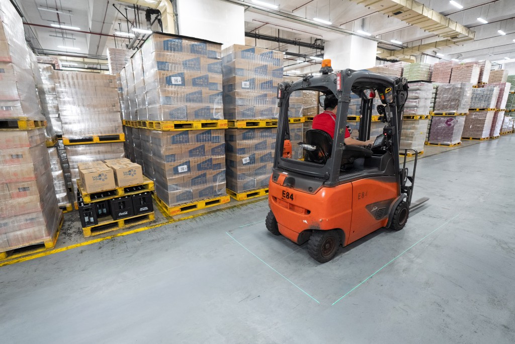 The Sha Tin plant uses truck and forklift telematics to monitor speed, following distance and braking in real time, while encouraging safe driving through a scoring system.