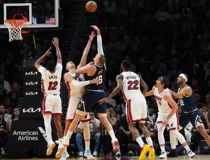 Nikola Jokic shoots against Nikola Jovic of the Miami Heat. AP