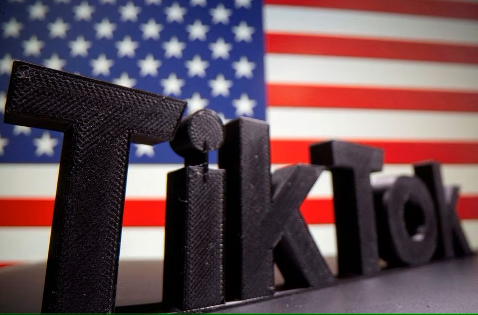 A 3D printed Tik Tok logo is seen in front of U.S. flag in this illustration taken October 6, 2020. Picture taken October 6, 2020. (Reuters) A 3D printed Tik Tok logo is seen in front of U.S. flag in this illustration taken October 6, 2020. Picture taken October 6, 2020. (Reuters)