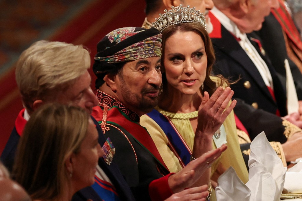 Britain's Catherine, Princess of Wales walks with Khalid bin Hilal Al Busaidi during the State Banquet at Windsor Castle, Windsor, on October 20, 2026, the first day of a three-day State Visit to the United Kingdom by The Sultan of Oman. (Photo by Isabel Infantes / POOL / AFP)