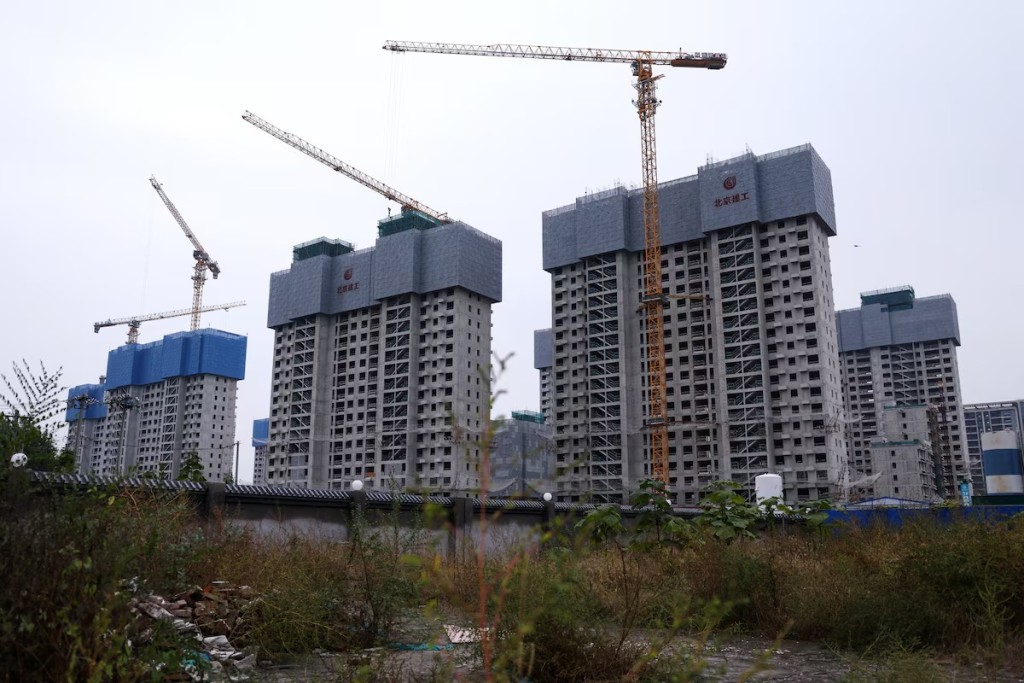 Residential buildings under construction in Beijing, China October 16, 2025. REUTERS