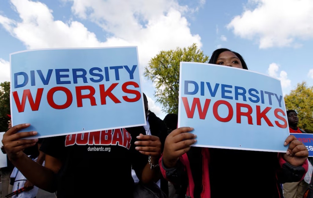 Students calling for diversity protest outside the U.S. Supreme Court in Washington October 10, 2012. REUTERS/Jose Luis Magana/File Photo