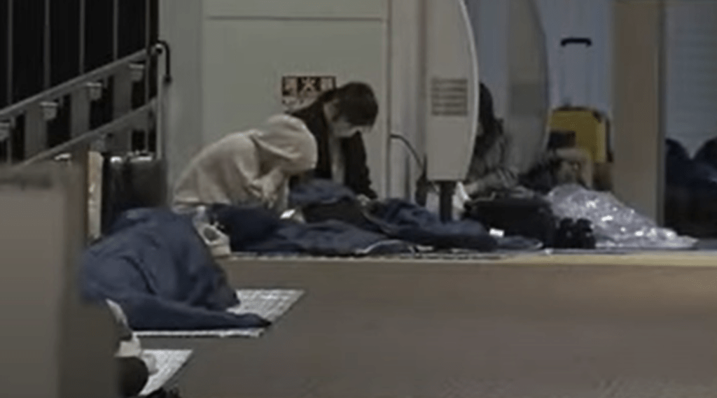 At New Chitose Airport in Hokkaido, sections of the ceiling were damaged, cracked, and peeling. Combined with a blizzard, about 200 passengers were stranded overnight. File Photo