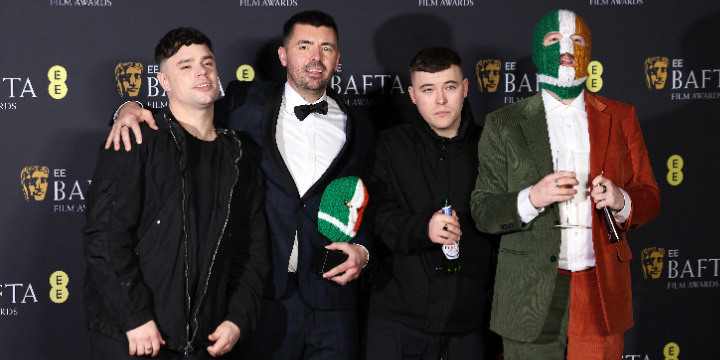 Mo Chara (Naoise O Caireallain), Moglai Bap (Liam Og O Hannaidh), Rich Peppiatt, and DJ Provai of Kneecap attend the 2025 BAFTAs on Feb. 16, 2025. (REUTERS/Isabel Infantes)