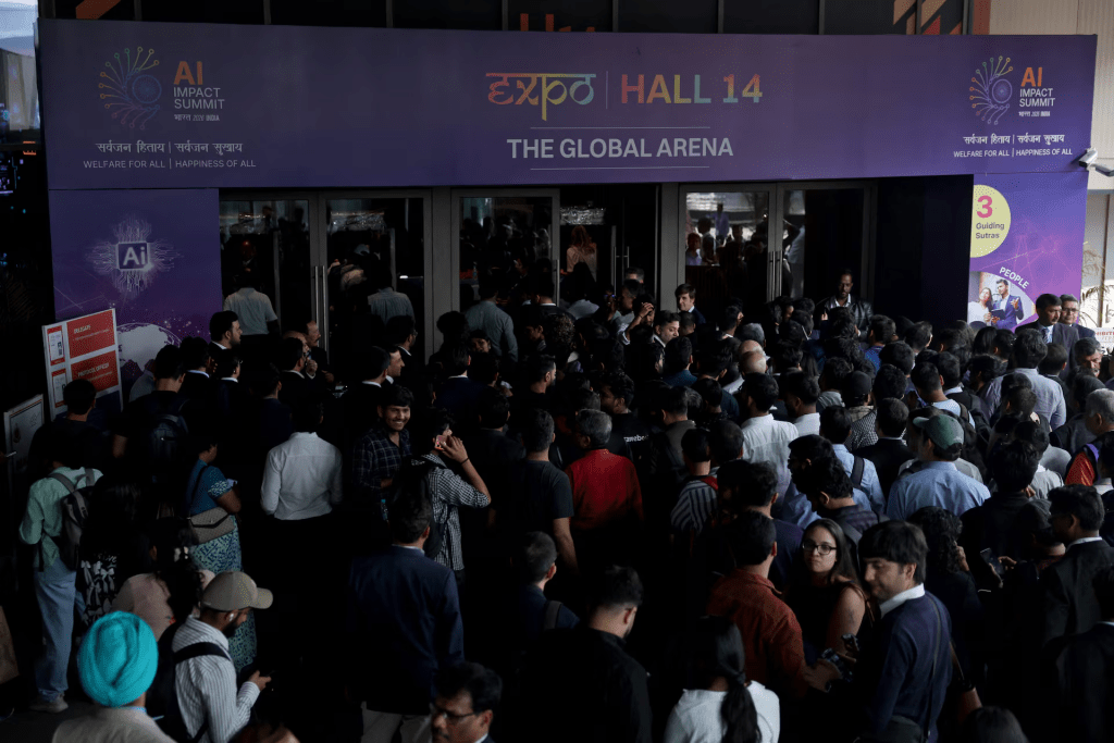 Visitors crowd to enter a hall at a venue for India AI Impact Summit at Bharat Mandapam in New Delhi, India, February 16, 2026. REUTERS/Bhawika Chhabra