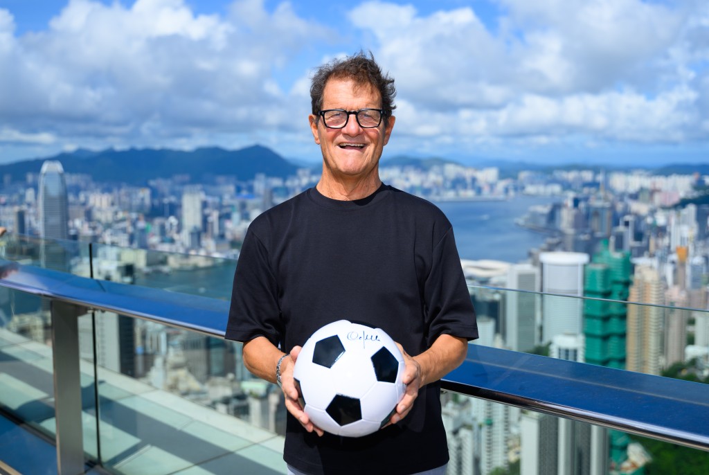 Italian coach Fabio Capello took in the breathtaking panoramic views of the city from The Peak.