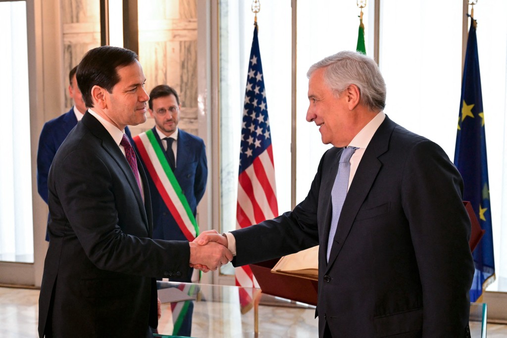 U.S. Secretary of State Marco Rubio shakes hands with Italy's Deputy Prime Minister and Foreign Minister, Antonio Tajani (R) during an Italian Citizenship Conferment Ceremony at the Palazzo della Farnesina, Italy's Foreign Ministry in Rome on May 8, 2026. (Photo by Stefano RELLANDINI / POOL / AFP)