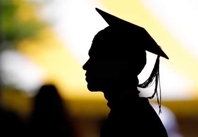 Students attend their graduation ceremony. (Reuters) Students attend their graduation ceremony. (Reuters)