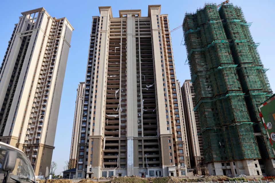 Residential buildings under construction are seen at Evergrande Cultural Tourism City. (Reuters) Residential buildings under construction are seen at Evergrande Cultural Tourism City. (Reuters)
