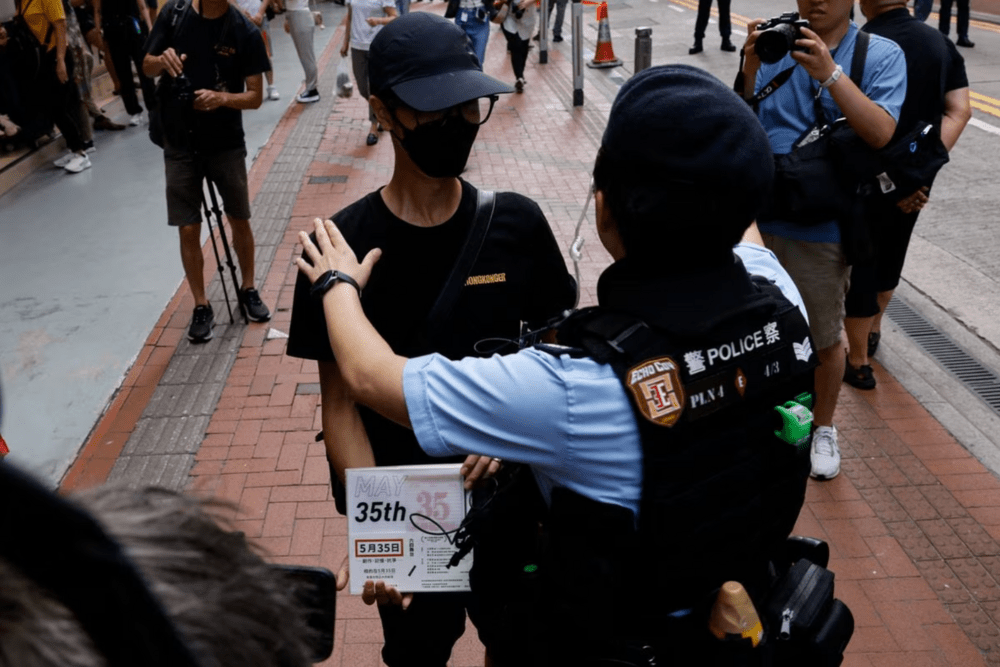 Police detain a man with the scripts of Chong Mui Ngam's Police detain a man with the scripts of Chong Mui Ngam's