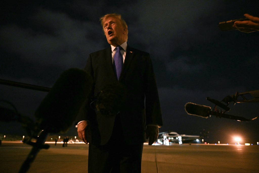 Photo by JIM WATSON / AFP US President Donald Trump speaks with the media before boarding Air Force One en route to Las Vegas at Los Angeles International Airport in Los Angeles on August 4, 2026.