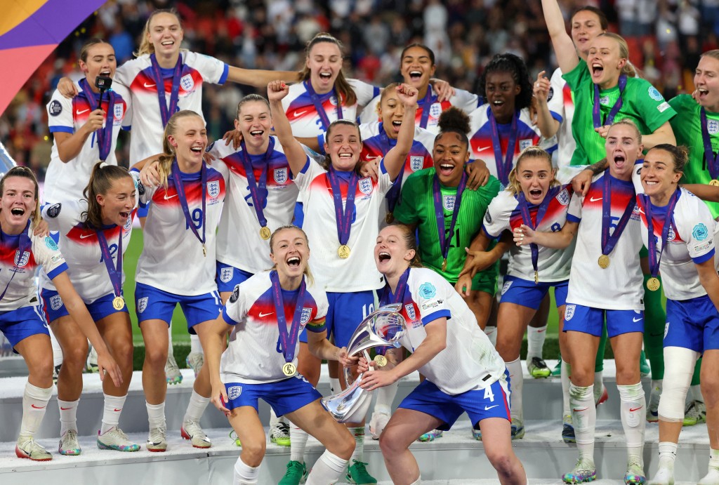 England's Leah Williamson and Keira Walsh lift the trophy as they celebrate with teammates after winning the UEFA Women's Euro 2025. (Reuters)