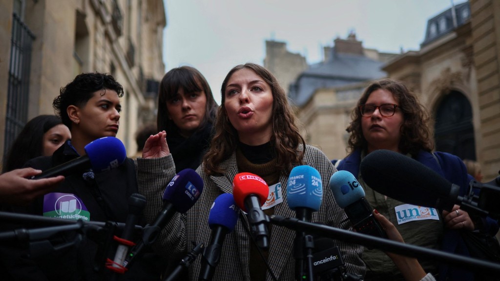 A student union representative speaks to the press in front of Hotel de Matignon in Paris, France. Reuters