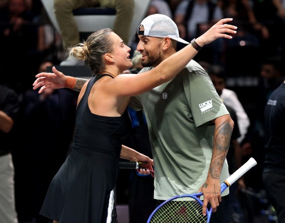 Nick Kyrgios and Aryna Sabalenka meet at the net after their match. AFP