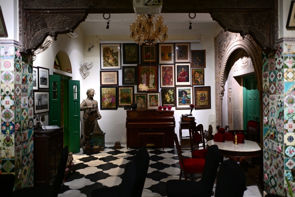 Photo by MANAN VATSYAYANA / AFP  This photograph taken on March 17, 2026 shows art collectibles at Kathika, a 19th-century haveli-turned-cultural centre and museum in the old quarters of Delhi.