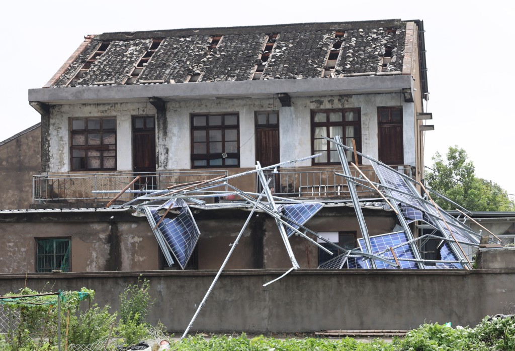 Solar panels damaged by winds from Typhoon Bavi are seen in Wenling, in China’s eastern Zhejiang province on July 12, 2026. (AFP)