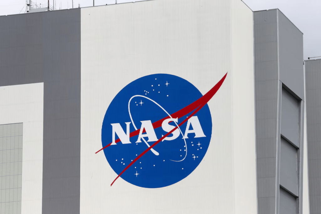 The NASA logo is seen at Kennedy Space Center ahead of the NASA/SpaceX launch of a commercial crew mission to the International Space Station in Cape Canaveral, Florida, U.S., April 16, 2021. REUTERS/Joe Skipper/File Photo 