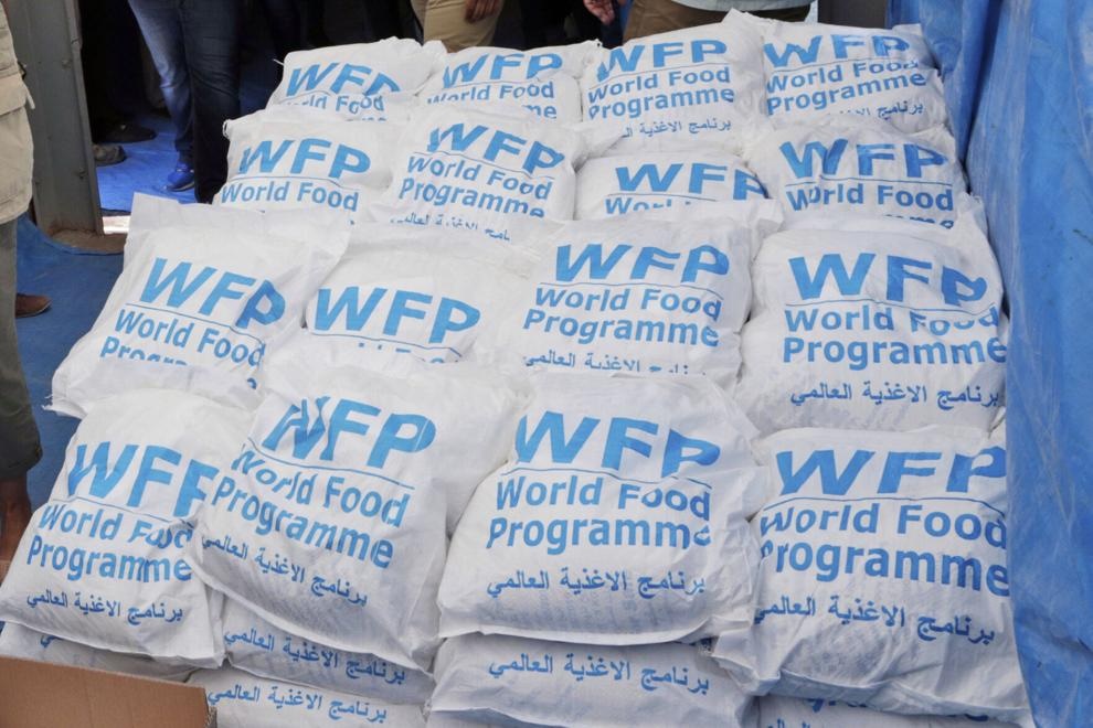 FILE - Food parcels provided by the World Food Program, part of the humanitarian aid shipments into Syria, are stacked at the Reyhanli border crossing with Syria, near Hatay, southern Turkey, Wednesday, May 24, 2017. Burhan Ozbilici - AP Pool FILE - Food parcels provided by the World Food Program, part of the humanitarian aid shipments into Syria, are stacked at the Reyhanli border crossing with Syria, near Hatay, southern Turkey, Wednesday, May 24, 2017. Burhan Ozbilici - AP Pool
