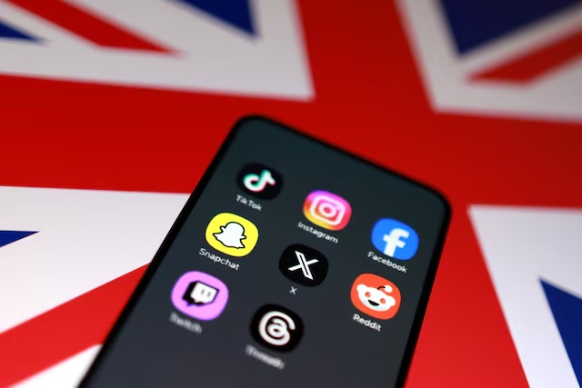 A Union Jack flag and social media app icons are seen in this illustration taken June 15, 2026. REUTERS/Dado Ruvic/Illustration
