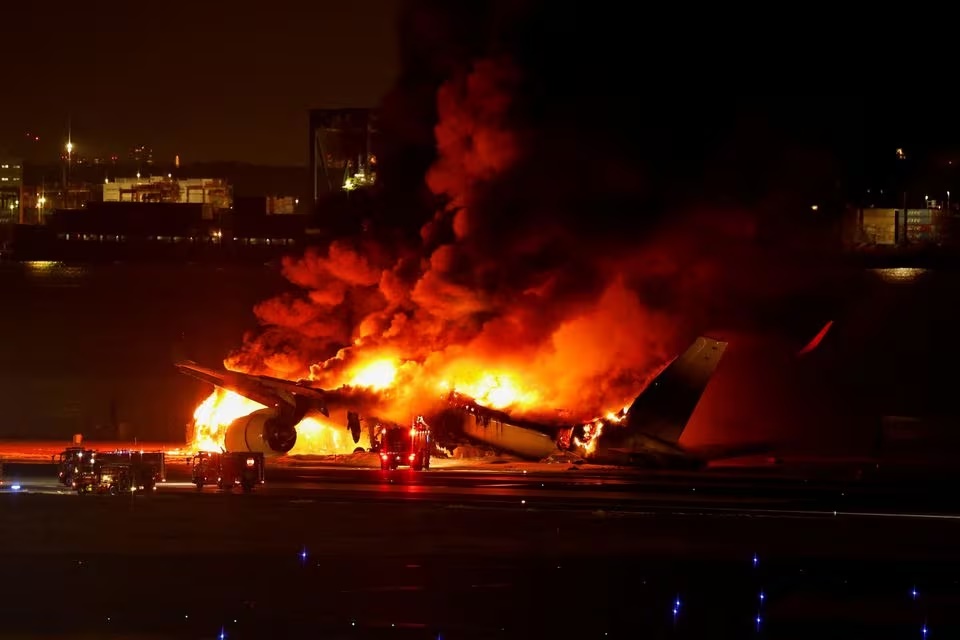 Japan Airlines' A350 airplane is on fire at Haneda international airport in Tokyo, Japan January 2, 2024. REUTERS/Issei Kato/File Photo Japan Airlines' A350 airplane is on fire at Haneda international airport in Tokyo, Japan January 2, 2024. REUTERS/Issei Kato/File Photo